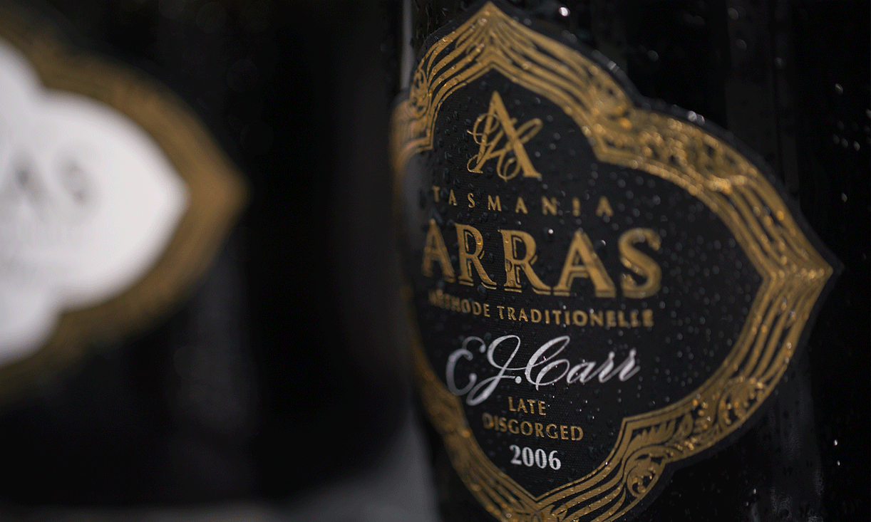 Close up view of 2006 chilled Arras wine bottle