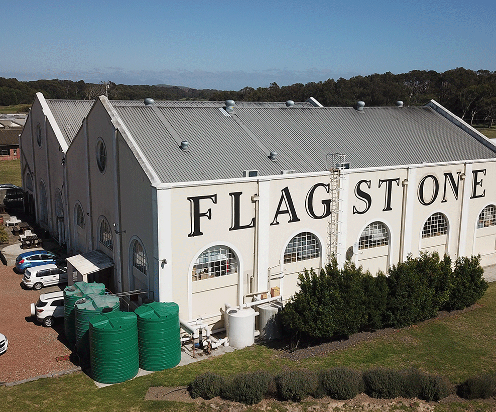 Aerial view of large building with Flagstone written along the side