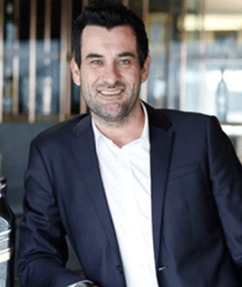 Corporate headshot of Joe Russo, General Manager ANZ