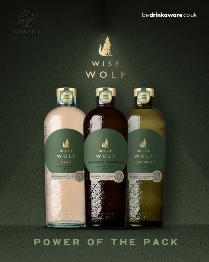 three bottle of wise wolf wines against a green background